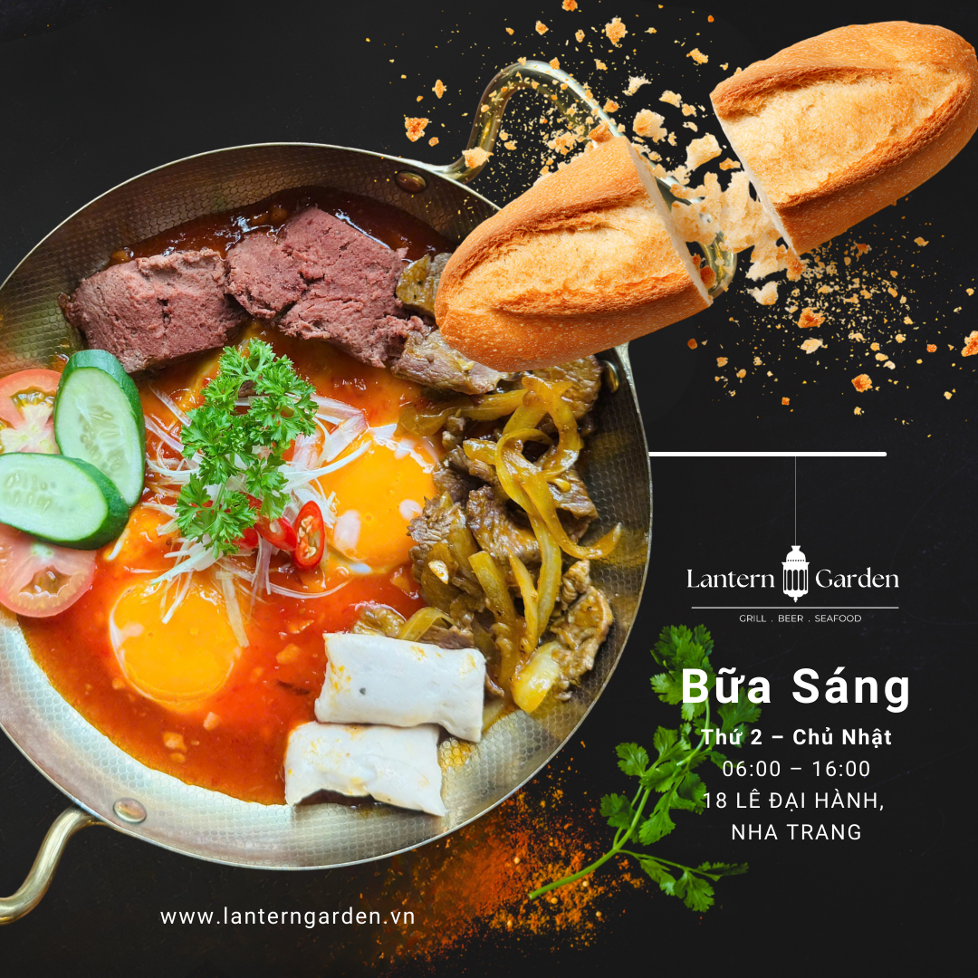 Bánh Mì Chảo with sunny-side-up egg, pâté, and Vietnamese sausage served hot in a pan at Lantern Garden Nha Trang